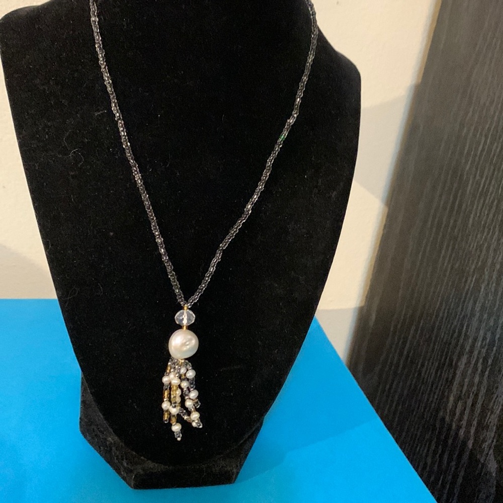 Baroque pearls and crystals accent this beautiful necklace
